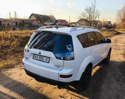Белый Мицубиси Аутлендер, объемом двигателя 2.4 л и пробегом 149 тыс. км за 9000 $, фото 2 на Automoto.ua