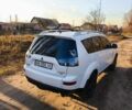 Белый Мицубиси Аутлендер, объемом двигателя 2.4 л и пробегом 149 тыс. км за 9000 $, фото 2 на Automoto.ua