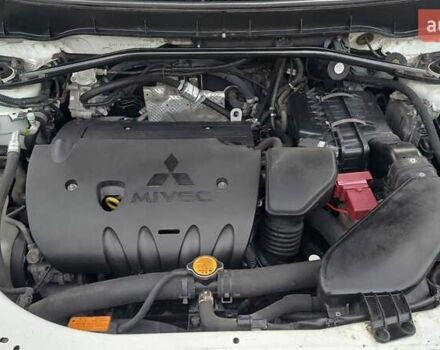 Белый Мицубиси Аутлендер, объемом двигателя 2.36 л и пробегом 185 тыс. км за 8950 $, фото 30 на Automoto.ua