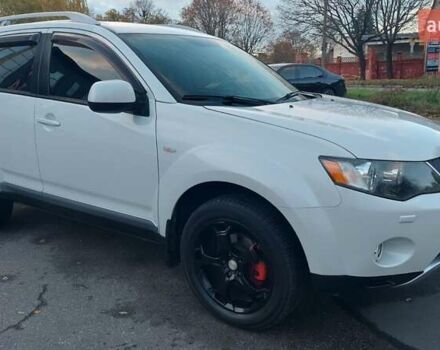 Белый Мицубиси Аутлендер, объемом двигателя 2.36 л и пробегом 185 тыс. км за 8950 $, фото 5 на Automoto.ua