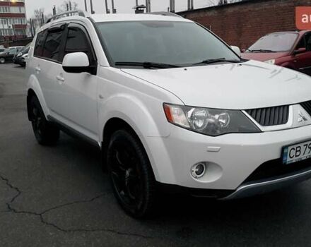 Белый Мицубиси Аутлендер, объемом двигателя 2.36 л и пробегом 186 тыс. км за 9250 $, фото 6 на Automoto.ua