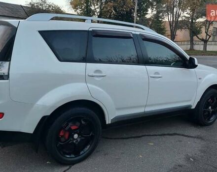 Белый Мицубиси Аутлендер, объемом двигателя 2.36 л и пробегом 185 тыс. км за 8950 $, фото 10 на Automoto.ua