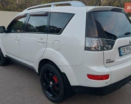 Белый Мицубиси Аутлендер, объемом двигателя 2.36 л и пробегом 185 тыс. км за 8950 $, фото 15 на Automoto.ua