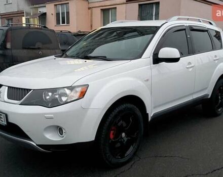 Белый Мицубиси Аутлендер, объемом двигателя 2.36 л и пробегом 186 тыс. км за 9250 $, фото 1 на Automoto.ua
