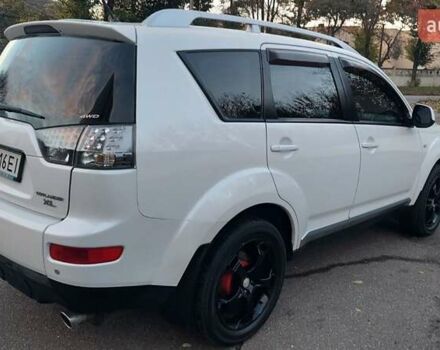 Белый Мицубиси Аутлендер, объемом двигателя 2.36 л и пробегом 185 тыс. км за 8950 $, фото 12 на Automoto.ua