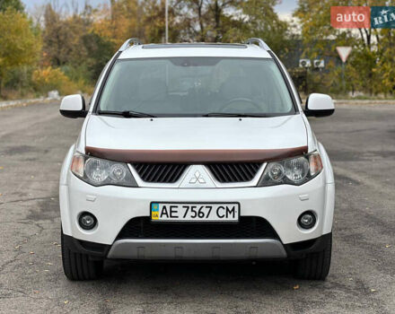 Белый Мицубиси Аутлендер, объемом двигателя 2.36 л и пробегом 160 тыс. км за 9299 $, фото 2 на Automoto.ua