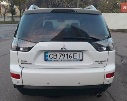 Белый Мицубиси Аутлендер, объемом двигателя 2.36 л и пробегом 185 тыс. км за 8950 $, фото 14 на Automoto.ua