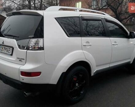 Белый Мицубиси Аутлендер, объемом двигателя 2.36 л и пробегом 186 тыс. км за 9250 $, фото 8 на Automoto.ua