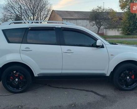 Белый Мицубиси Аутлендер, объемом двигателя 2.36 л и пробегом 185 тыс. км за 8950 $, фото 8 на Automoto.ua