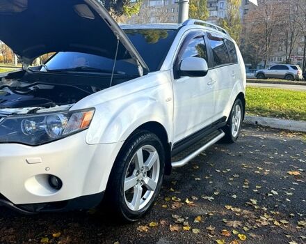 Белый Мицубиси Аутлендер, объемом двигателя 2.4 л и пробегом 230 тыс. км за 9000 $, фото 9 на Automoto.ua