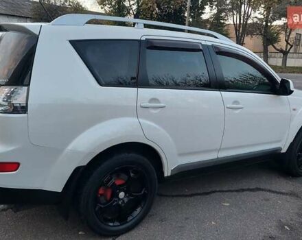 Белый Мицубиси Аутлендер, объемом двигателя 2.36 л и пробегом 185 тыс. км за 8950 $, фото 11 на Automoto.ua