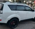 Белый Мицубиси Аутлендер, объемом двигателя 2.36 л и пробегом 185 тыс. км за 8950 $, фото 11 на Automoto.ua