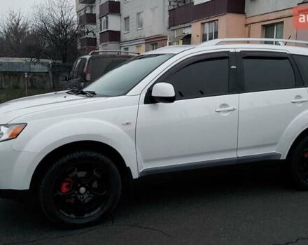 Белый Мицубиси Аутлендер, объемом двигателя 2.36 л и пробегом 186 тыс. км за 9250 $, фото 3 на Automoto.ua
