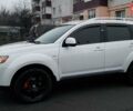Белый Мицубиси Аутлендер, объемом двигателя 2.36 л и пробегом 186 тыс. км за 9250 $, фото 3 на Automoto.ua