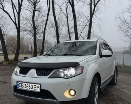 Белый Мицубиси Аутлендер, объемом двигателя 2.4 л и пробегом 329 тыс. км за 8800 $, фото 2 на Automoto.ua