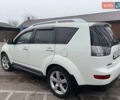 Белый Мицубиси Аутлендер, объемом двигателя 2.4 л и пробегом 329 тыс. км за 10400 $, фото 19 на Automoto.ua