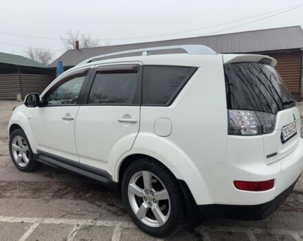 Белый Мицубиси Аутлендер, объемом двигателя 2.4 л и пробегом 329 тыс. км за 8800 $, фото 4 на Automoto.ua
