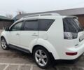 Белый Мицубиси Аутлендер, объемом двигателя 2.4 л и пробегом 329 тыс. км за 8800 $, фото 4 на Automoto.ua