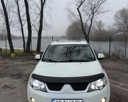 Белый Мицубиси Аутлендер, объемом двигателя 2.4 л и пробегом 329 тыс. км за 8800 $, фото 3 на Automoto.ua