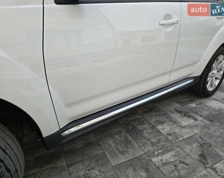 Білий Міцубісі Аутлендер, об'ємом двигуна 2.36 л та пробігом 178 тис. км за 10200 $, фото 65 на Automoto.ua