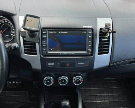 Білий Міцубісі Аутлендер, об'ємом двигуна 2.18 л та пробігом 198 тис. км за 11500 $, фото 25 на Automoto.ua