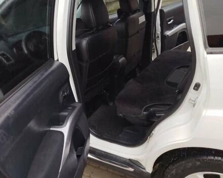 Мицубиси Аутлендер 2010 в Косове на Automoto.ua Белый Мицубиси Аутлендер, объемом двигателя 2.36 л и пробегом 283 тыс. км за 10000 $, фото 3 на Automoto.ua