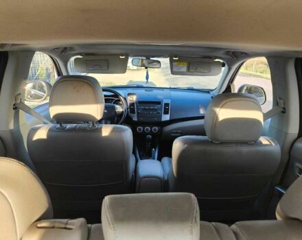 Белый Мицубиси Аутлендер, объемом двигателя 2 л и пробегом 170 тыс. км за 3744 $, фото 12 на Automoto.ua