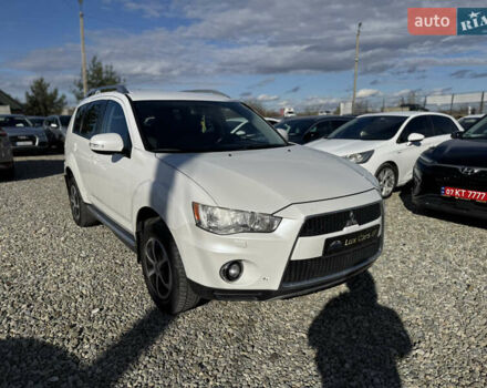 Белый Мицубиси Аутлендер, объемом двигателя 2.18 л и пробегом 271 тыс. км за 8700 $, фото 2 на Automoto.ua