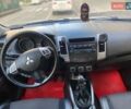 Білий Міцубісі Аутлендер, об'ємом двигуна 2.27 л та пробігом 229 тис. км за 11000 $, фото 1 на Automoto.ua