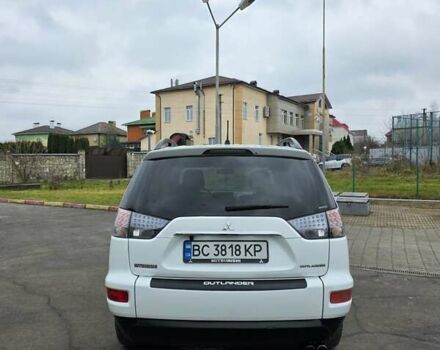Білий Міцубісі Аутлендер, об'ємом двигуна 2.27 л та пробігом 243 тис. км за 9800 $, фото 4 на Automoto.ua