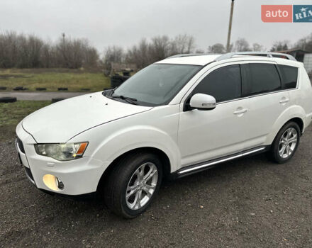 Белый Мицубиси Аутлендер, объемом двигателя 2.2 л и пробегом 266 тыс. км за 9300 $, фото 3 на Automoto.ua