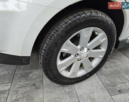 Білий Міцубісі Аутлендер, об'ємом двигуна 2.36 л та пробігом 178 тис. км за 10200 $, фото 56 на Automoto.ua