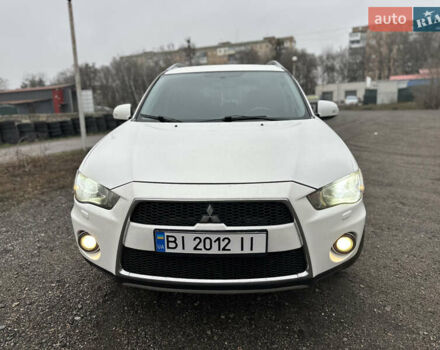 Белый Мицубиси Аутлендер, объемом двигателя 2.2 л и пробегом 266 тыс. км за 9300 $, фото 2 на Automoto.ua