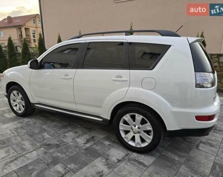 Білий Міцубісі Аутлендер, об'ємом двигуна 2.36 л та пробігом 178 тис. км за 10200 $, фото 4 на Automoto.ua
