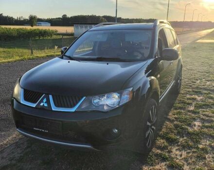 Белый Мицубиси Аутлендер, объемом двигателя 2 л и пробегом 170 тыс. км за 3744 $, фото 4 на Automoto.ua