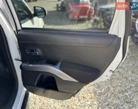 Белый Мицубиси Аутлендер, объемом двигателя 2.18 л и пробегом 271 тыс. км за 8700 $, фото 25 на Automoto.ua