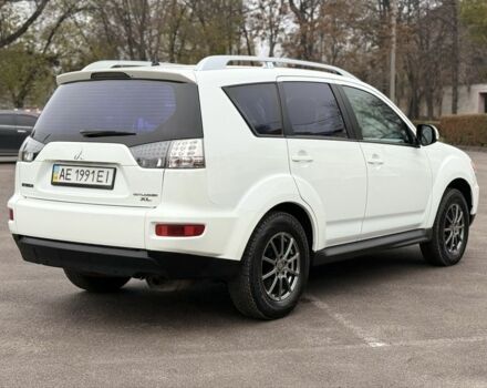 Білий Міцубісі Аутлендер, об'ємом двигуна 2.4 л та пробігом 250 тис. км за 10000 $, фото 2 на Automoto.ua