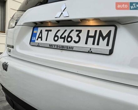 Білий Міцубісі Аутлендер, об'ємом двигуна 2.36 л та пробігом 178 тис. км за 10200 $, фото 60 на Automoto.ua
