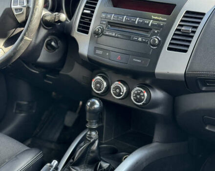 Белый Мицубиси Аутлендер, объемом двигателя 2.18 л и пробегом 271 тыс. км за 8700 $, фото 29 на Automoto.ua