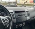 Білий Міцубісі Аутлендер, об'ємом двигуна 2.2 л та пробігом 245 тис. км за 10300 $, фото 6 на Automoto.ua
