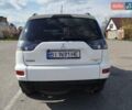 Белый Мицубиси Аутлендер, объемом двигателя 2.4 л и пробегом 157 тыс. км за 11000 $, фото 6 на Automoto.ua