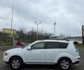 Білий Міцубісі Аутлендер, об'ємом двигуна 2.27 л та пробігом 243 тис. км за 9800 $, фото 6 на Automoto.ua