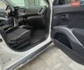 Білий Міцубісі Аутлендер, об'ємом двигуна 2.36 л та пробігом 178 тис. км за 10200 $, фото 29 на Automoto.ua