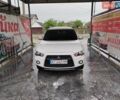 Мицубиси Аутлендер 2010 в Косове на Automoto.ua Белый Мицубиси Аутлендер, объемом двигателя 2.36 л и пробегом 283 тыс. км за 10000 $, фото 11 на Automoto.ua