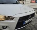 Білий Міцубісі Аутлендер, об'ємом двигуна 2.36 л та пробігом 178 тис. км за 10200 $, фото 47 на Automoto.ua