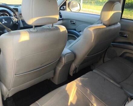 Белый Мицубиси Аутлендер, объемом двигателя 2 л и пробегом 170 тыс. км за 3744 $, фото 11 на Automoto.ua