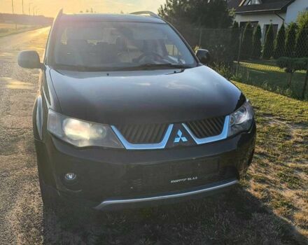 Белый Мицубиси Аутлендер, объемом двигателя 2 л и пробегом 170 тыс. км за 3744 $, фото 9 на Automoto.ua
