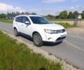 Белый Мицубиси Аутлендер, объемом двигателя 2 л и пробегом 170 тыс. км за 2869 $, фото 3 на Automoto.ua