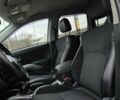 Білий Міцубісі Аутлендер, об'ємом двигуна 2.27 л та пробігом 243 тис. км за 9800 $, фото 11 на Automoto.ua