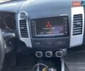 Белый Мицубиси Аутлендер, объемом двигателя 2.2 л и пробегом 260 тыс. км за 11000 $, фото 13 на Automoto.ua
